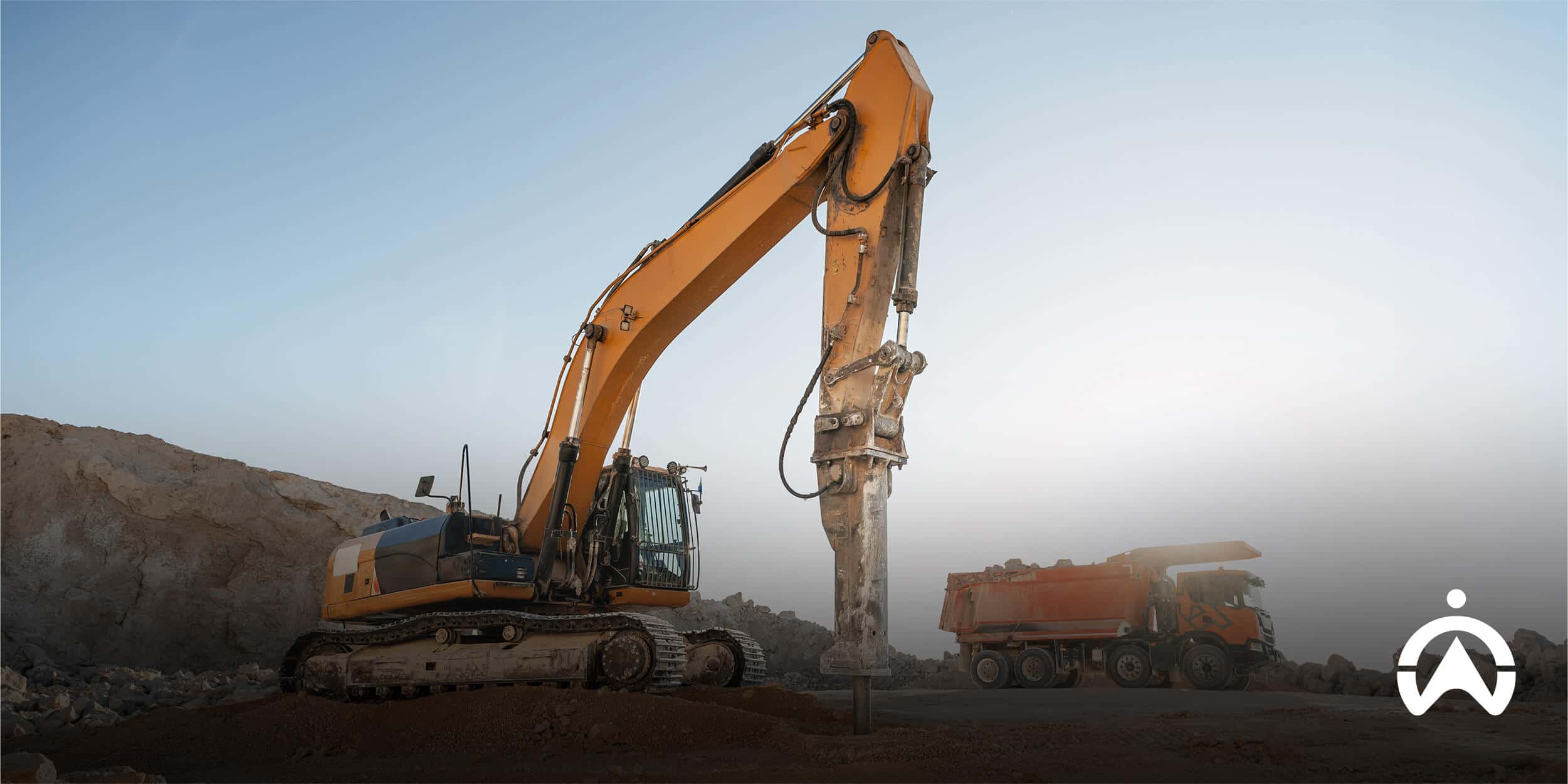 Construction equipment tracking showing a hydraulic breaker excavator and dump truck working on dirt terrain.